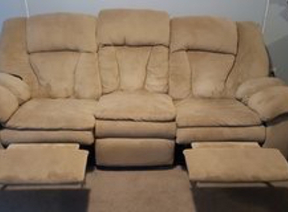 Turkel Design - Cambridge, MA. I love this sofa, this is my wish list, middle lets down and you have two cup holder plus two plug ins and two USB slots. NICE!!!