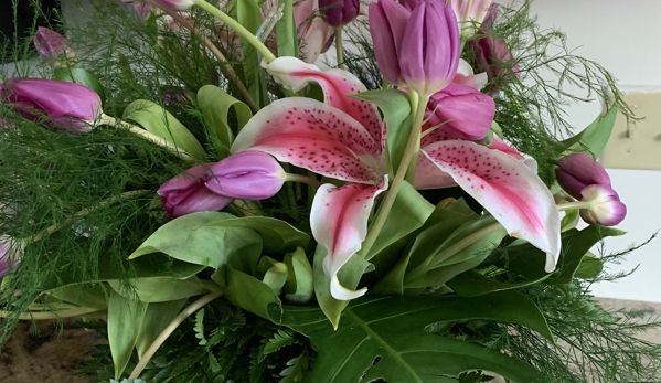 Arlington Flower Shop - Jacksonville, FL. Monsters leaves DO NOT NOR SHOULD THEY EVER GO WITH TULIPS!!!