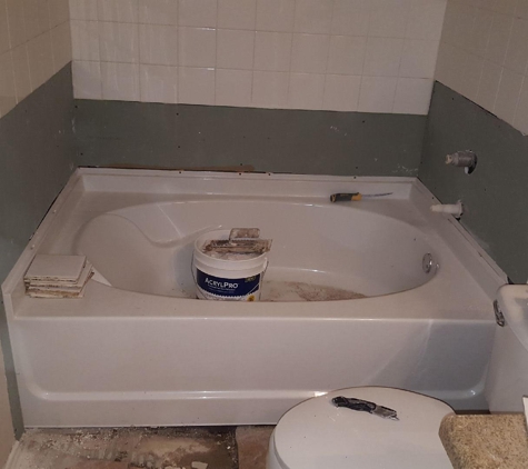 Premier Contracting Service, LLC - Houston, TX. GARDEN TUB STYLE REPLACEMENT WITH TILES