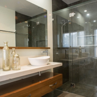 Bradnam's Windows & Doors - Warana, QLD. 3-Panel Frameless Shower Screen