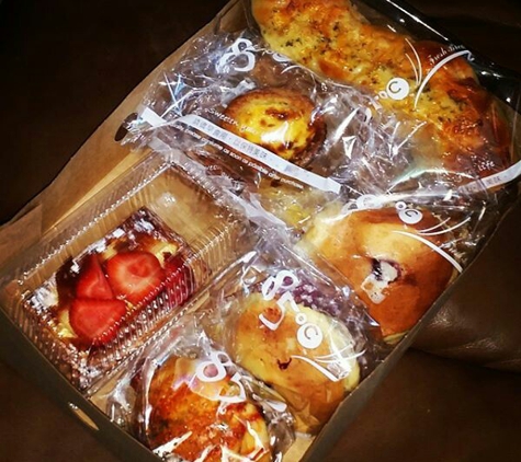 85 Degrees C Bakery Cafe - West Covina, CA. Box full if their yummie pasteries...yumyum...their blueberry cream cheese muffin is the yummiest!  :)