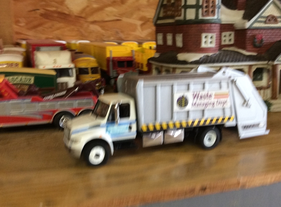 J & J Refuse Services - Springfield, MO. Miniature recreation of J&J Refuse service trash truck  1/64 scale.