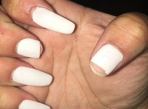 T K Nails - Houston, TX. 2 days later 2 more nails broke off.