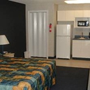 Studio Inn & Suites - Hotels