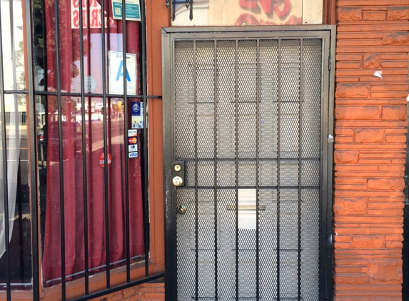 Awash Ethiopian Restaurant - Los Angeles, CA. Their frond door is always closed. Just walk in.