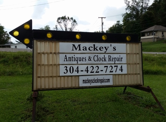 Mackey's Antiques & Clock Repair - Parkersburg, WV. I snapped this when leaving the shop after picking up a repair . Wonderful place . I will go back just to look at all the amazing time piece