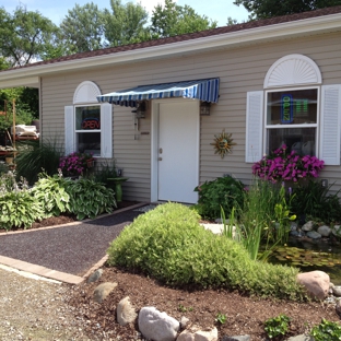 The Backyard Oasis Pond and Garden Center & Integrity Outdoor Services - Flint, MI