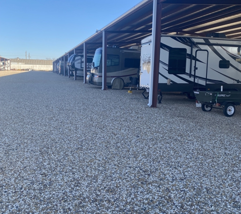Caravan Self Storage & RV - Lubbock, TX. Coveded RV Stalls with electric and wide isles