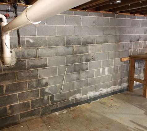 Harris Waterproofing & Construction, Inc. - Lilburn, GA. Before. CMU walls seep at mortar points