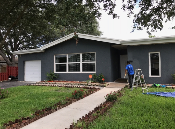 Blue Ocean Painting Corp - Hollywood, FL. One of the employees working hard, getting the job done.