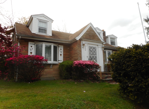 Curb Appeal Landscaping & Design - Lansdowne, PA. Trimmed bushes and pulled ivy. I have since hired them for the back yard.