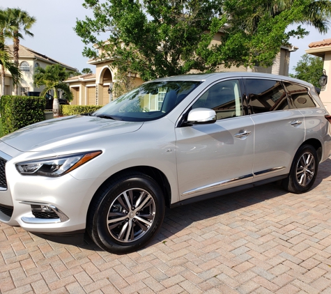 Off Lease Only West Palm Beach - West Palm Beach, FL. Bill Lewis of Vero Beach making a double vehicle purchase at Off-Lease Only in West Palm Beach, Florida.