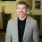 Clint Barrett, DDS, MD