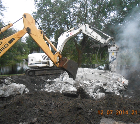 AAA Excavating Svcs., LLC - Cocoa, FL. Demo hot tub & Pool & Slab