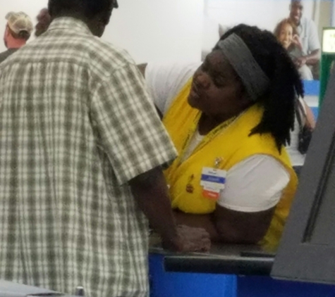 Walmart Supercenter - Cedar Rapids, IA. This lady will only check her friends out. Remember when I said I'm calling your manager? I did. I don't lie. "Have a nice day!"