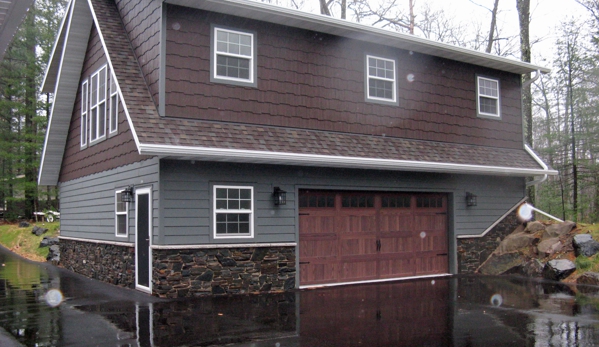 The Lakewood Companies, Inc. - Arbor Vitae, WI. Built Attic Loft Garage with extra living space. Exterior has cottage feel