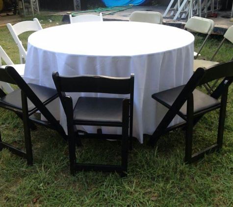 Alexandra Party Rentals - Houston, TX. Round tables black white chair