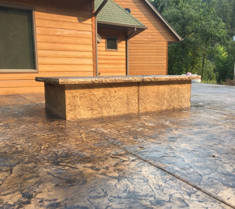 Canyon Concrete Corp. Stamped patio with fire pit