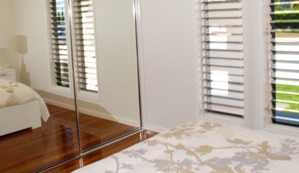 Bradnam's Windows & Doors - Urraween, QLD. Sliding Wardrobe Door With Mirror Inserts