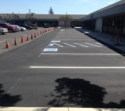 Summit Paving Contractors - Lodi, CA. Commercial parking lot paving, ADA parking stall upgrade, striping and sealcoating.