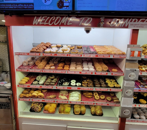 Dandee Donut Factory - Pompano Beach, FL. Bill Lewis stopping in at Dandee Donuts in Fort Lauderdale.