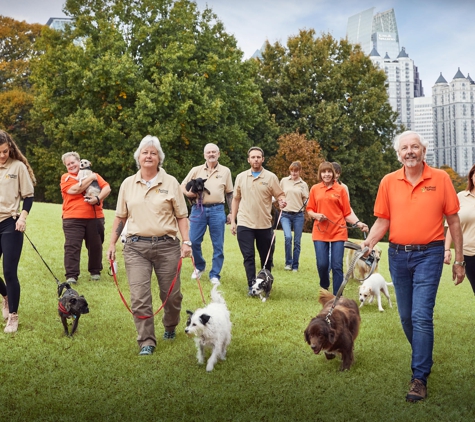 Buckhead Paws Dog Walking and Pet Sitting Services of Atlanta - Atlanta, GA. Our team of professional employees out for a stroll in Piedmont Park