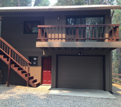 Painter & Wallpaper Hanger - Clovis, CA. Painting the exterior of this mountain cabin in Yosemite.