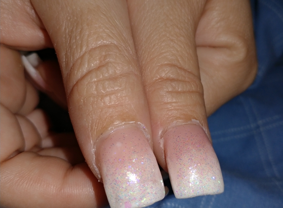 Wild Cherry Beauty Salon - Port Richey, FL. Don't go here!!! Your nails will look like crooked shovels!!!