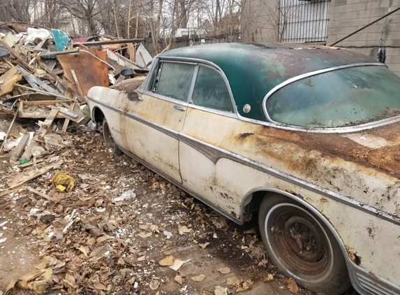 DK TOWING LLC - Kansas City, KS. Recovered from 33rd than Parrelle  by DK TOWING LLC. after the building fell down on the Two vehicles of 3 that could be restored,.