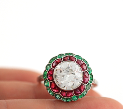 Freddy's Fine Jewelry - Miami, FL. Art deco style made out in platinum diamonds, french cut Rubies and emeralds