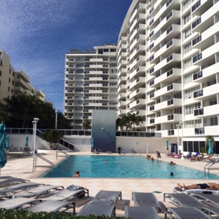 Decoplage Realty - Miami Beach, FL