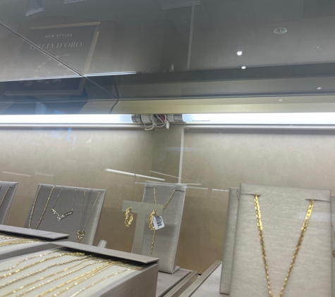 Logan Electric Service Inc - Fredericksburg, VA. Servicing the case lighting inside Jared Jewelers