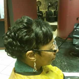 Friends Salon - Desoto, TX. Shampoo & condition and curl iron style