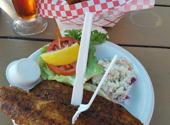 Woody's Waterfront - St Pete Beach, FL. Woodys Fish sandwich and killians.