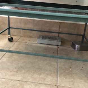 Gilcrease Nature Sanctuary - Las Vegas, NV. Mouse trap underneath occupied bird cage