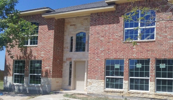 Alexander and Xavier Masonry - Garland, TX. New Build Stone and Brick Home