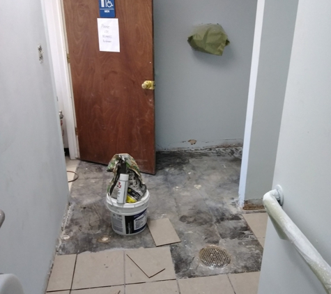 Ferrell and Son's Residential Property Maintenance. Before and after photos of gas station bathroom remodel