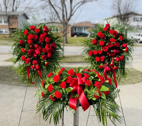 Lula's Floral & Gifts - Glenwood, IL. Red roses and carnation Standing spray with Casket