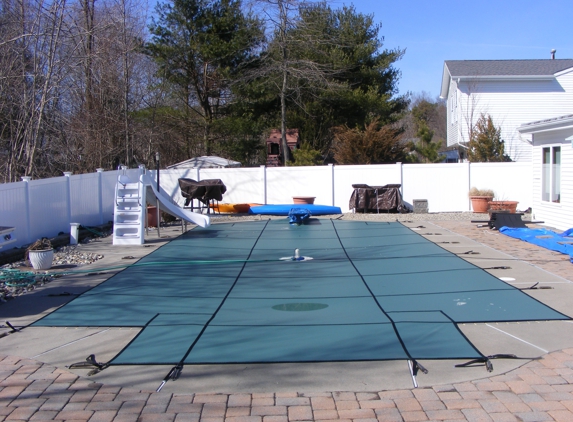 S & R Pools, LLC - Bristol, PA. Solid Green Safety Cover