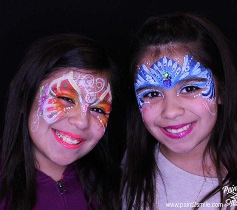 Paint 2 Smile. Two beautiful face painted princesses