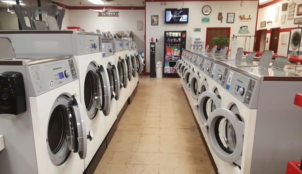 Laura's Laundromat - Mustang, OK. 17 high capacity, energy effecient washing machines