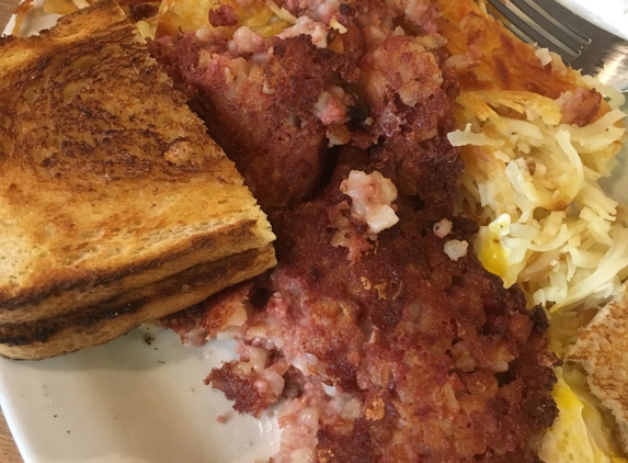 Pinecrest Diner - San Francisco, CA. Corned beef hash with eggs and toast for $12. Here, sourdough toast, eggs over easy, and perfect hash browns. Love the crust on corned beef!