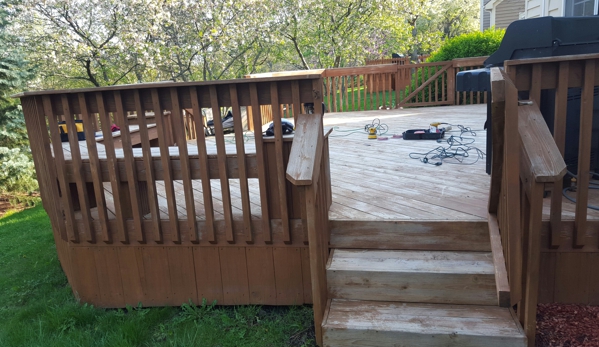 CHJ Painting & Remodeling, Inc. - Niles, IL. Riverwoods deck during sanding by the CHJ Painting