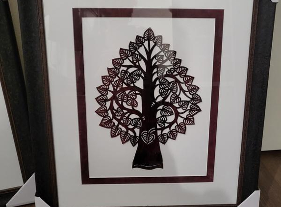 Rococo Framing - Newtown, NSW. The tree is made of leather
