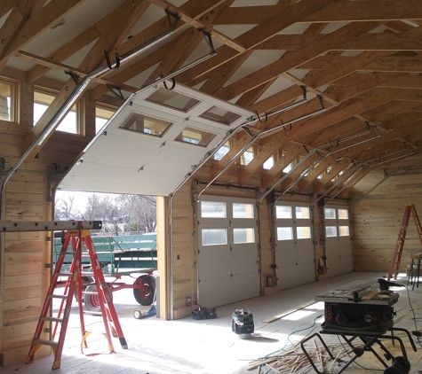 Absolute Quality Garage Door Service, LLC - Brighton, CO. I specialize in custom garage door installation including high lift and roof pitch track.