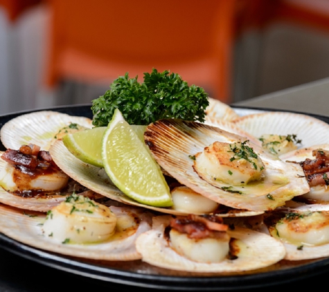 Grunske's by the RIver - Bundaberg East, QLD. Herb Garlic Scallop - Want to book today? Click on the link here!