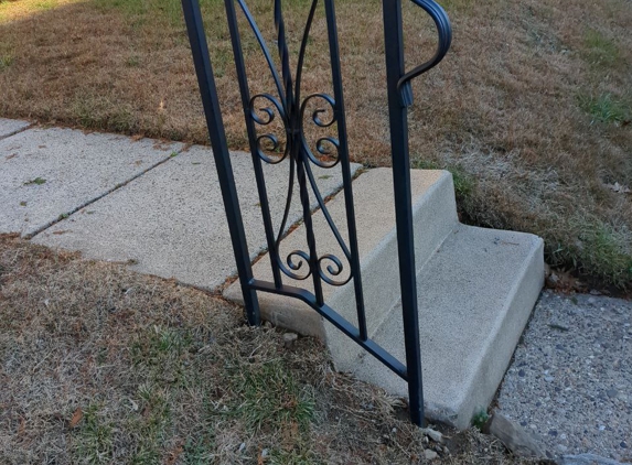 Anvil Iron Works, Inc. - Sicklerville, NJ. Here is the beautiful railing cemented next to the existing steps! We LOVE it!