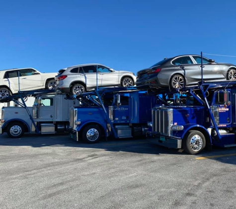 Shaw Auto Carriers - Melbourne, FL. New Cars on our New Trucks! This is how we roll!