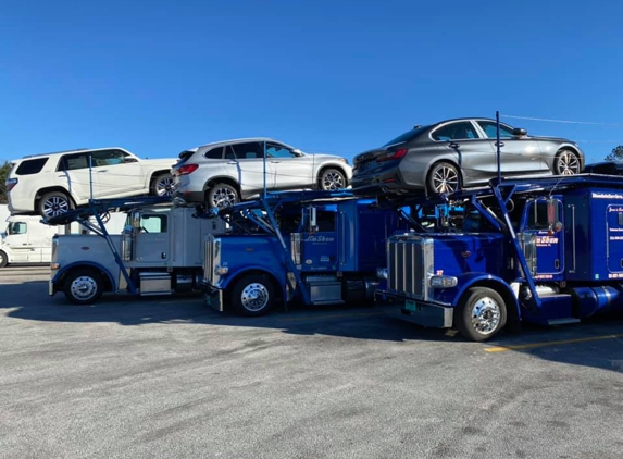 Shaw Auto Carriers - Melbourne, FL. New Cars on our New Trucks! This is how we roll!