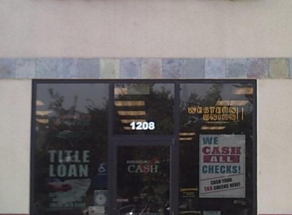 Check Into Cash - Tulare, CA